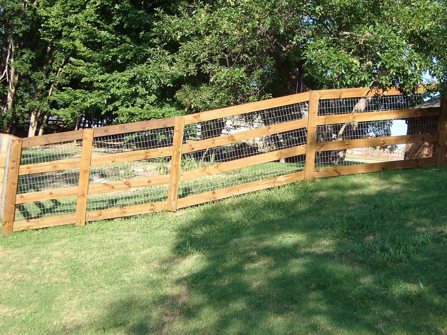 Picture of a ranch rail fence from a North Dallas Fort Worth fencing contractor
