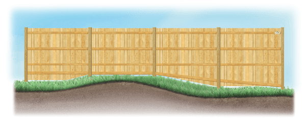 A stepped fence on sloped ground in Cross Roads Texas